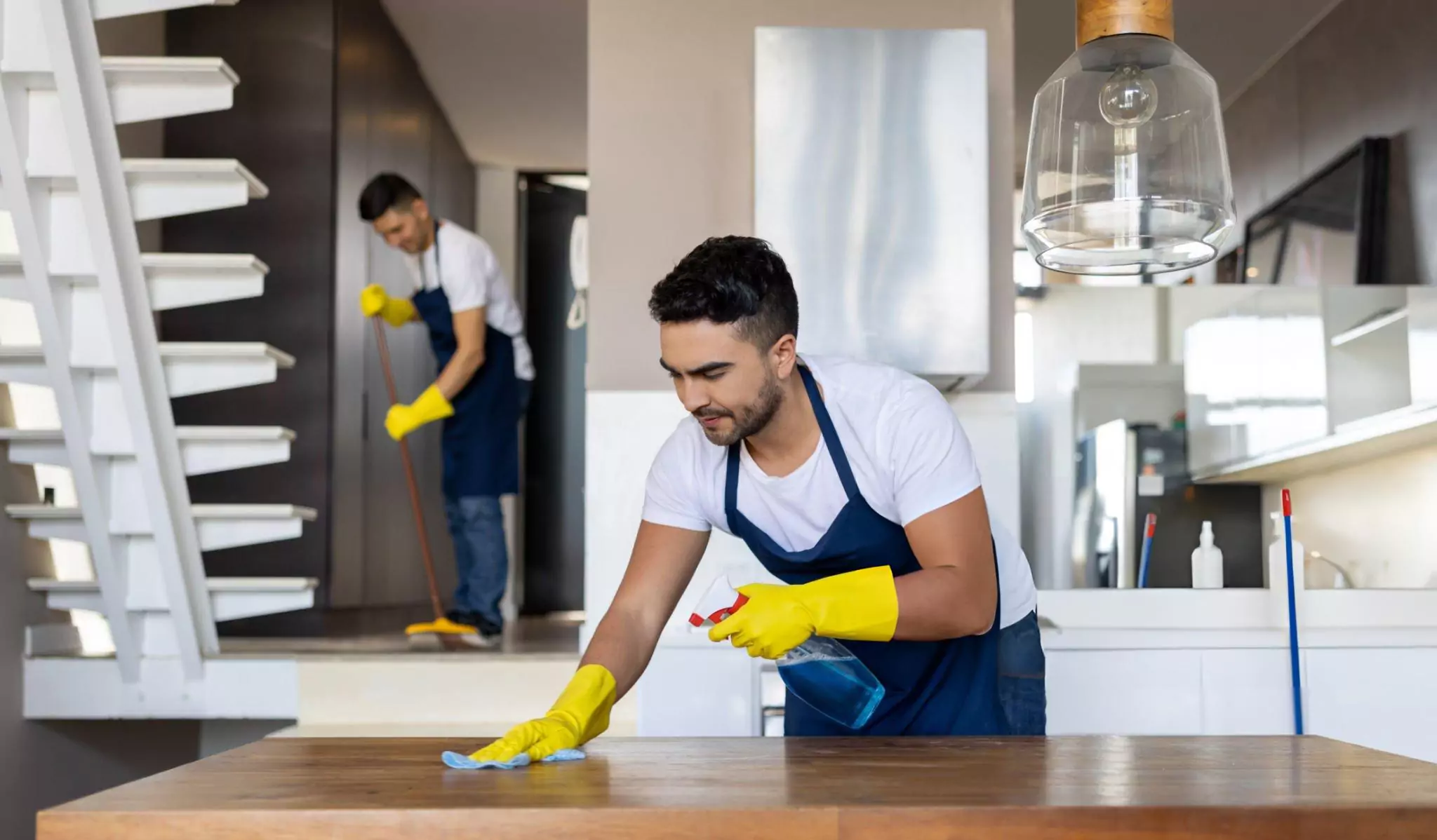 Whats the Difference Between Regular Cleaning and Deep Cleaning Cleanzen Image of Professional Cleaners Cleaning Apartment.jpg