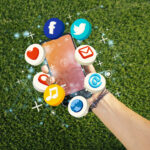 hand holding smartphone social media concept