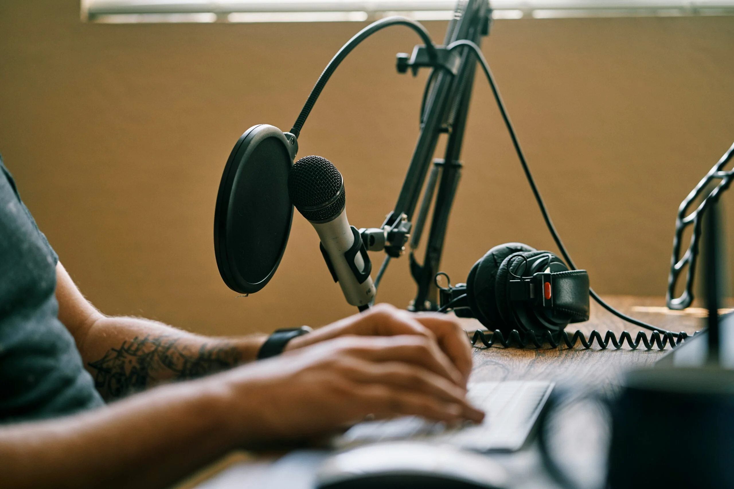 Why Businesses Are Turning to Podcasts—and Why Local Recording Studios Make Sense 2 kit formerly convertkit waxDxYM2XI4 unsplash scaled 1