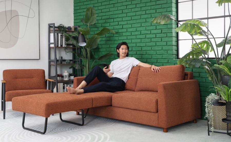 A Pop of Warmth: Embracing an Orange Sofa Bed